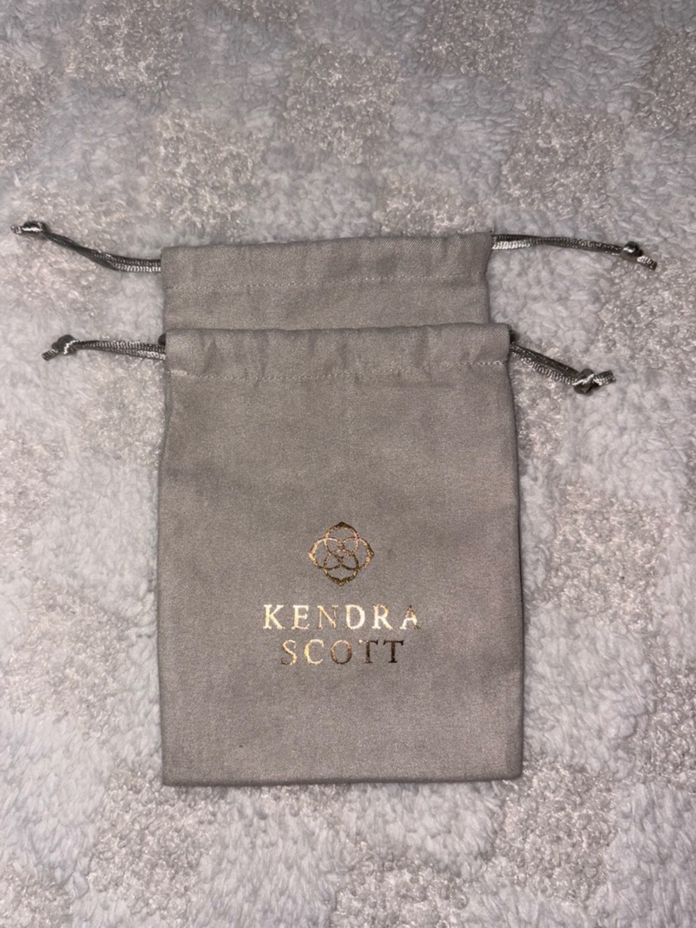 Two Kendra Scott Gray Drawstring Jewelry Pouches with Gold Logo • 5.5” x 4.25”